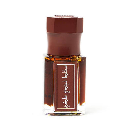 Buy Mukhallat Nagdy Malaky online – Premium Arabic perfume oil with saffron and rose.