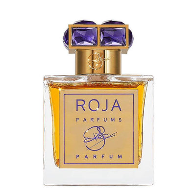 Roja Parfums Haute Luxe bottle with gold flakes and purple Swarovski cap.