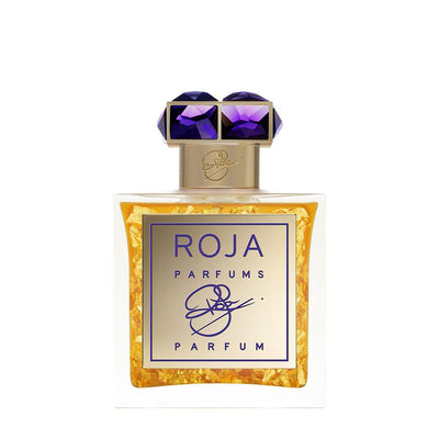 Close-up of authentic 24-carat gold flakes suspended in Roja Haute Luxe fragrance liquid available at PerfumeX.in
