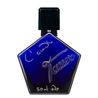 Luxury niche perfume – Tauer L’Oudh with oud, tobacco, and ambergris notes.