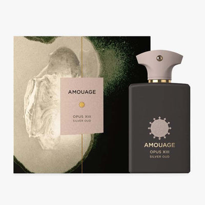 Amouage Opus XIII Silver Oud Eau De Parfum bottle with a dark cap and a label featuring the brand name and product title.
