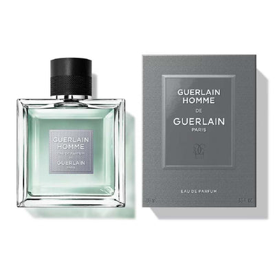 Guerlain Homme Eau De Parfum bottle and packaging, featuring a clear glass bottle with a black cap and a grey box with brand and product name.
